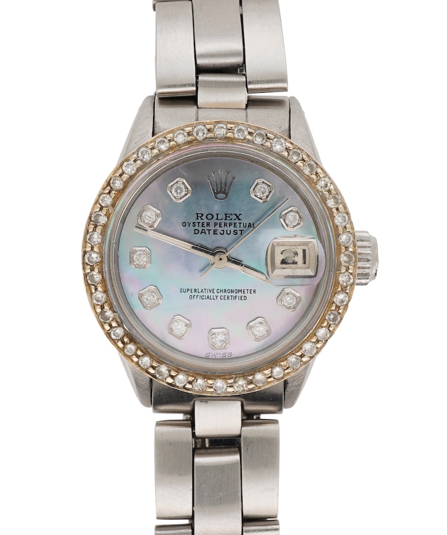 A lady's late 1960's stainless steel Rolex Oyster Perpetual Datejust, with later after market diamond set bezel and mother of pearl dial with diamond dot markers
